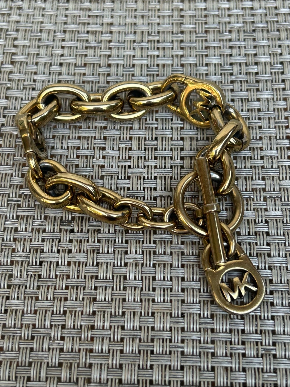 Michael Kors Gold color chunky Link Chain Bracelet with MK Toggle/Charm